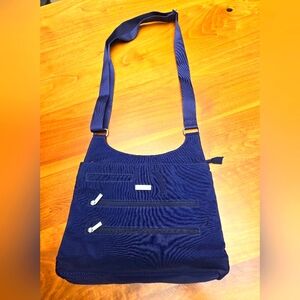 Baggalini Stylish Navy Blue adjustable Shoulder Bag. Pink lining. Washable.